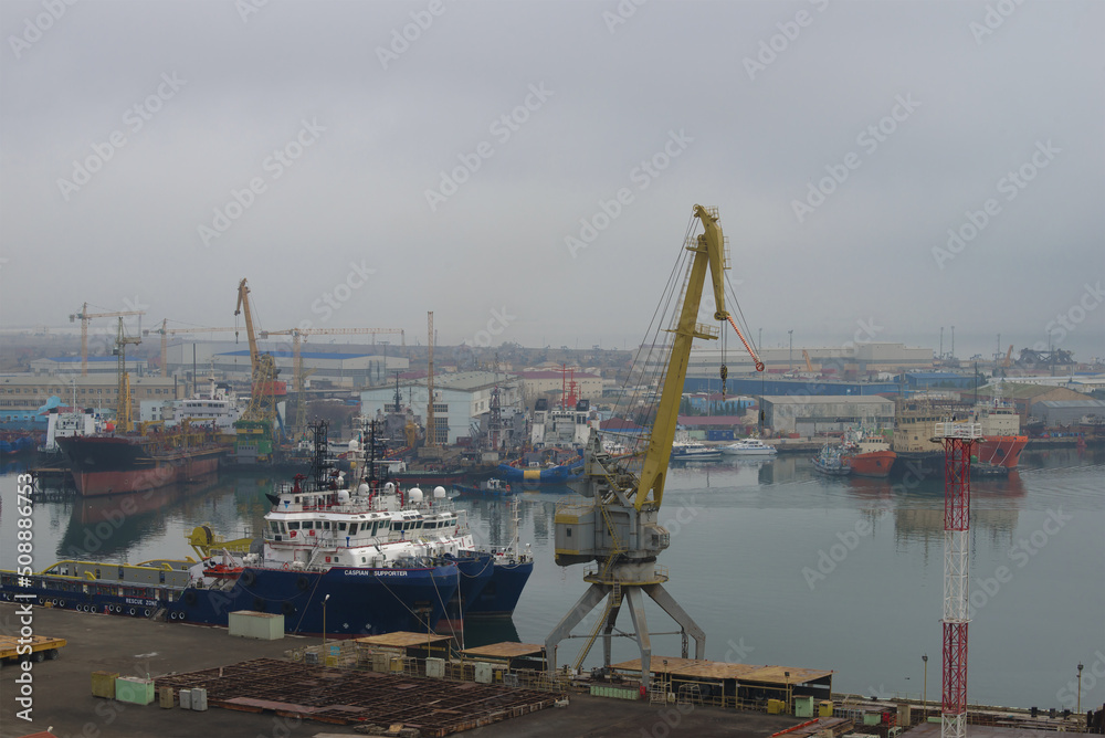 Misty January morning in the Ilyich bay. Baku port