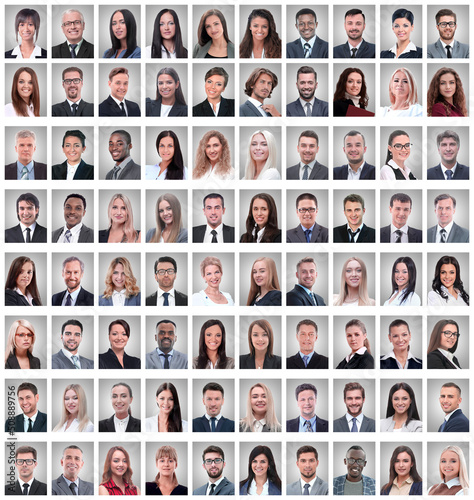 portraits of a group of successful employees isolated on white