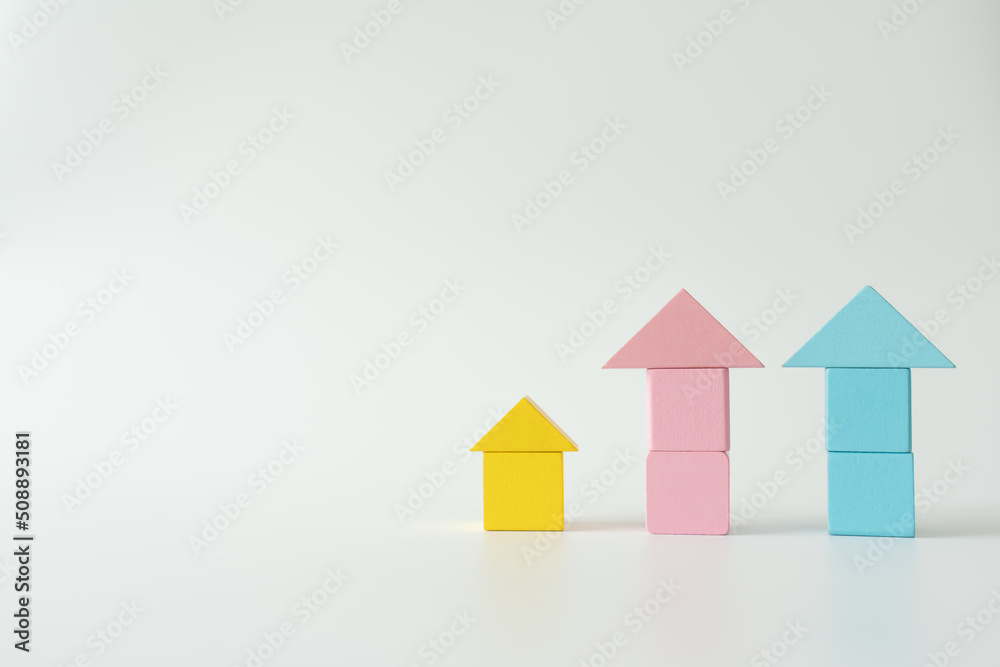 Small toy wooden blocks build to house model concept of property investment and real estate market. Small toy wooden blocks build to house model concept of property investment and real estate market.