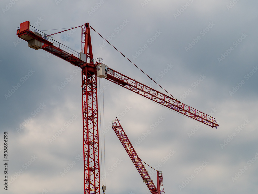 Construction and tower cranes.