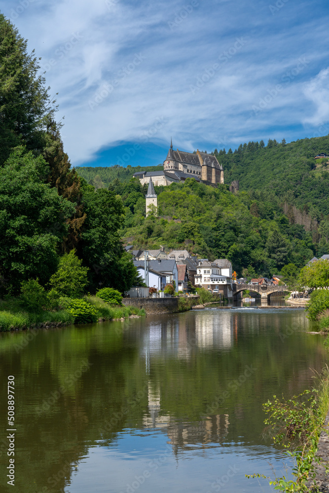 vertical view of the picturesque village and castle of Vianden on the Our River in Luxembourg
