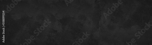 Black plaster wide panoramic texture. Dark gloomy grunge abstract textured background