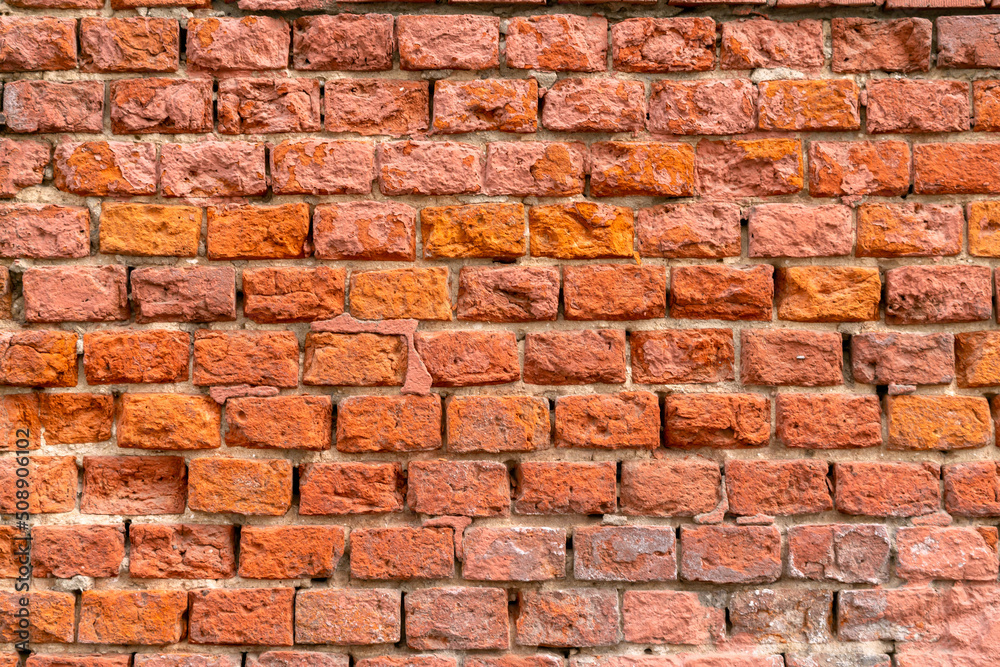 Brick wall of the building. Designer building background. Brick wall of the building. Designer building background.