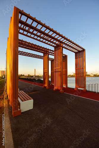 Sunrise in Bucharest. A beautiful morning in the new park promenade next to Morii Lake (Lacul Morii). Landmarks of Bucharest, visit Romania. photo