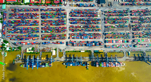 Aerial view of Cat Lai port with cargo ship and container Ho chi Minh city  Vietnam. The port is an important hub for import and export of important goods in Ho Chi Minh City