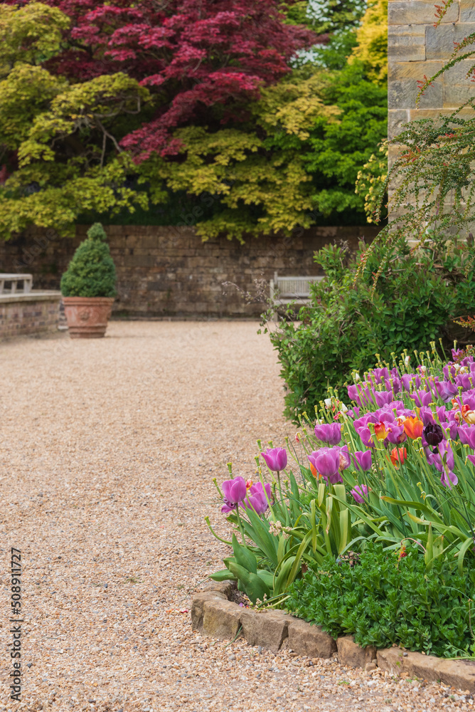 Beautiful vibrant landscape image of quintessential English country garden in Spring or Summer
