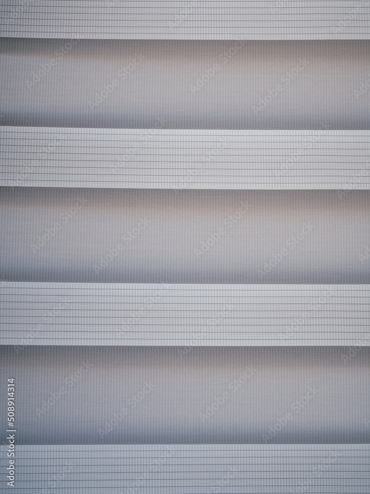 Fototapeta premium White textured striped background lit by natural light