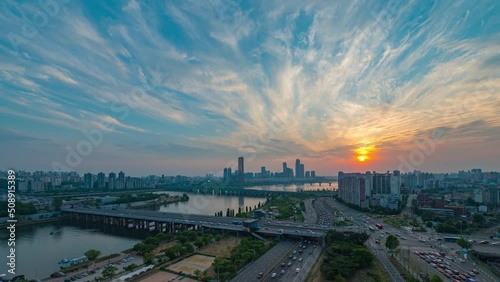Top view Sunset with Traffic . 63 building at Seoul City and Han river,Downtown skyline in Seoul, South Korea.