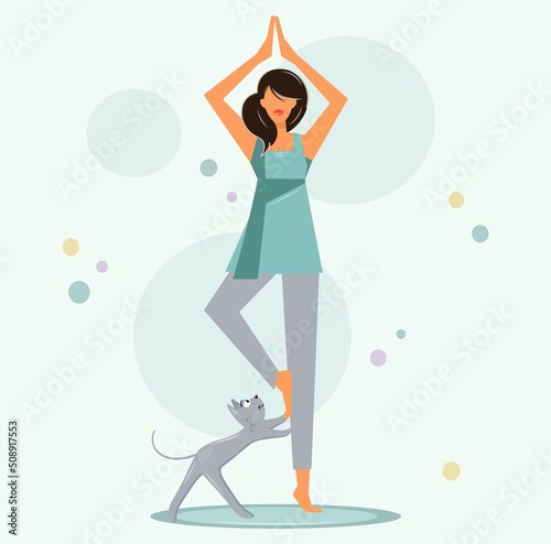 A cute girl is training next to her gray cat on a yoga mat. A young woman in a tree pose goes in for sports. Next to her is a funny curious kitten. Vector, flat style with place for text.