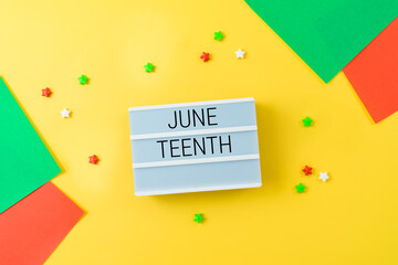 African American holiday Juneteenth background with lightbox and colorful bright paper