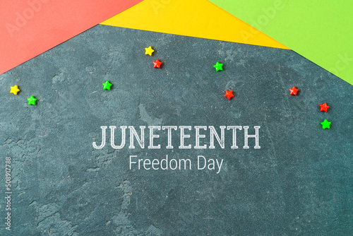 Background for Juneteenth holiday day with colorful paper