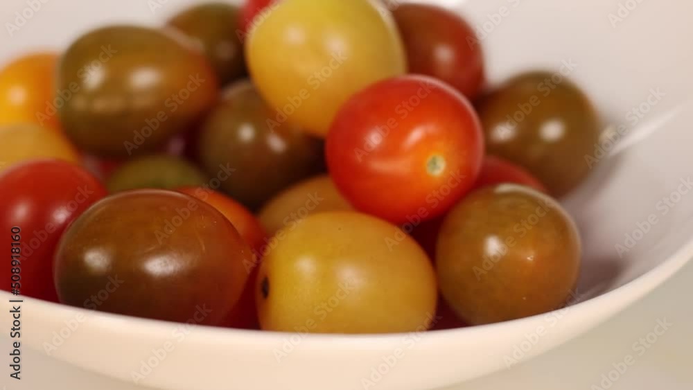 cherry tomatoes in a white plate on a white table. Close-up shooting in a restaurant.
cherry tomatoes in a white plate on a white table. Close-up shooting in a restaurant.