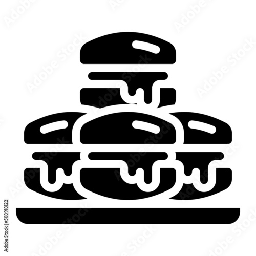 macaron glyph icon