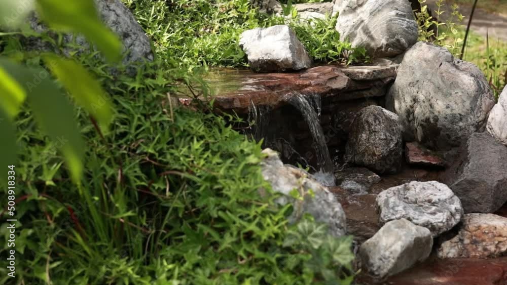 small waterfall in the garden
small waterfall in the garden
