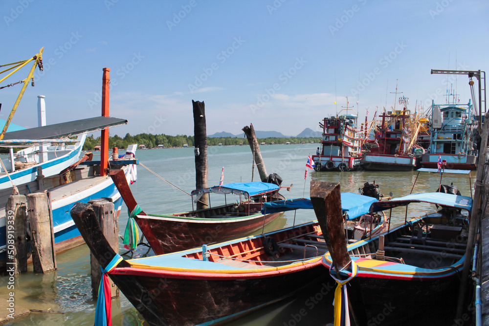 Fishing boats floating in the calm seas are a way of life in Asia.