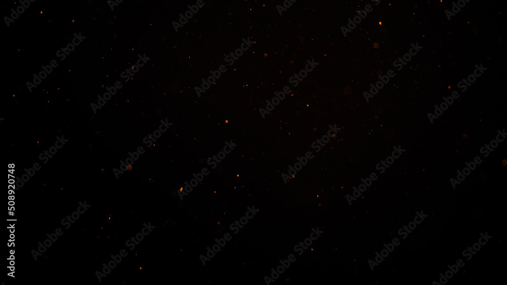 Fototapeta premium sparks like particles floating in air over black background