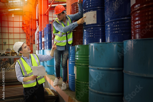 The Caucasian engineer talking and discussing in production line process after check and inspection the machine in factory, professional technician operating or work in manufacturing industrial