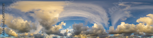 Dramatic sunset sky panorama with Cumulus clouds. Seamless hdr 360 pano in spherical equirectangular format. Complete zenith for 3D visualization, game and sky replacement for aerial drone panoramas photo