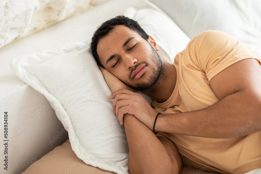 Middle Eastern Man Sleeping Lying In Bed Resting In Bedroom Middle Eastern Man Sleeping Lying In Bed Resting In Bedroom