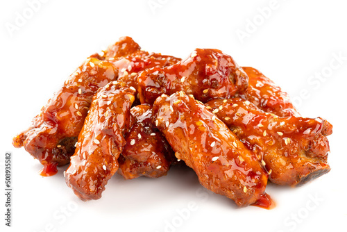 Fototapete Isolated fried chicken wings with sweet sauce on white background