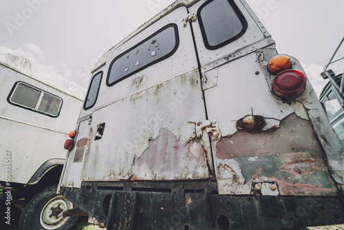 Old rusty cars for safari in the jungle of Africa