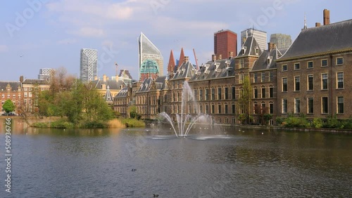 The Hague, Netherlands. 4k footage Binnenhof castle (Dutch Parliament) and water fountain in downtown Hague. photo
