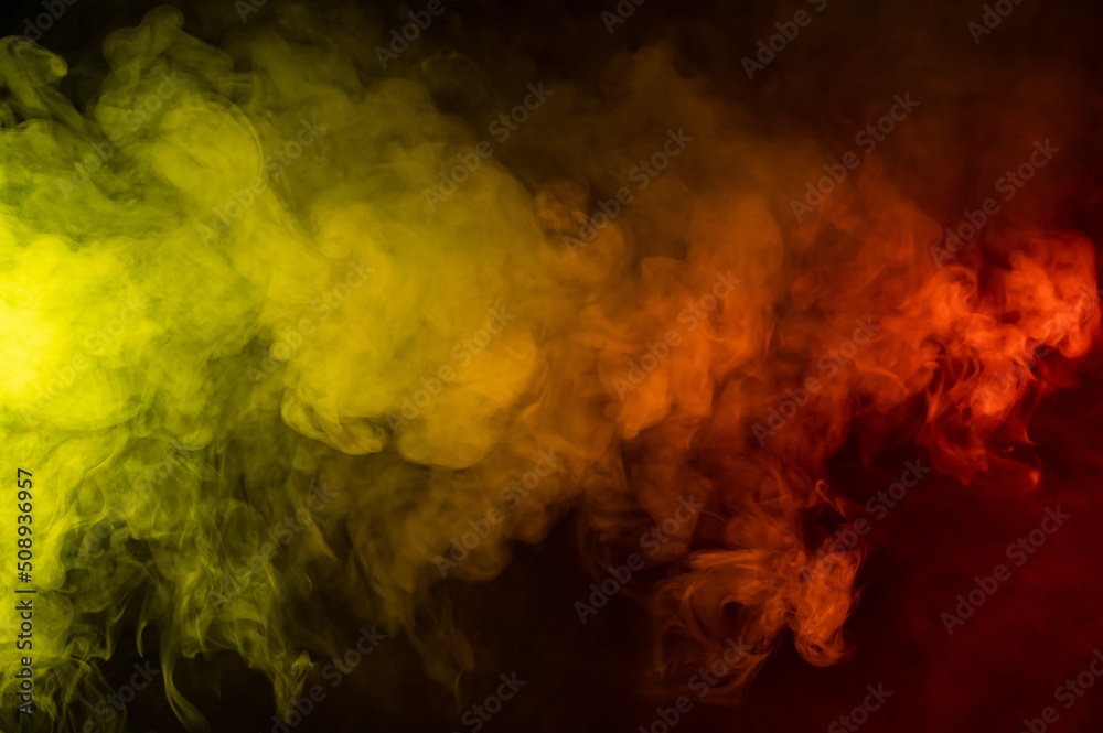 Red-yellow smoke spreads on a black background.