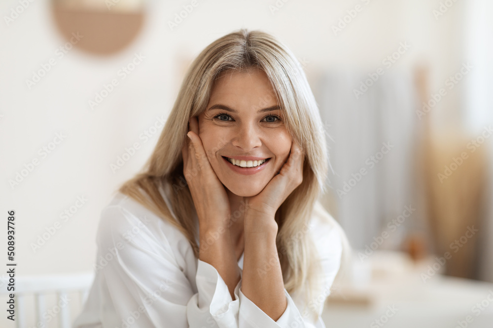 Attractive Middle Aged Woman with a Beautiful Smile Near the
