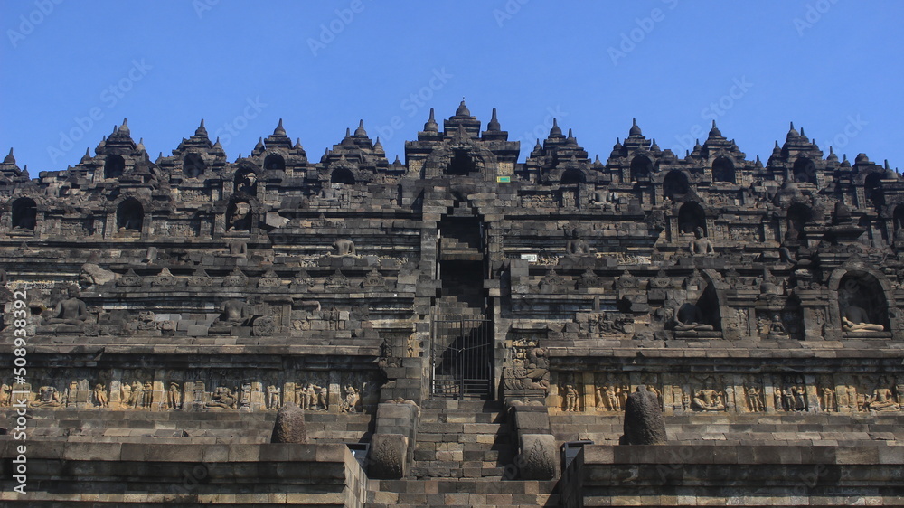 Naklejka premium Architectural masterpieces of the archipelago's past at Borobudur Temple, located in Central Java, Indonesia. This temple was founded by the Syailendra dynasty.
