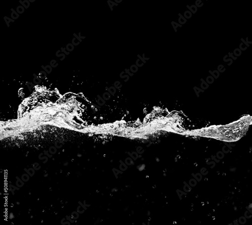 A waterline with clear water and waves on a black background. Waterline overlay effect with splashes and bubbles.