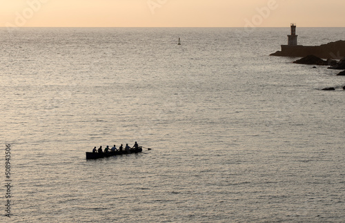 rowers in trawler training in the sea