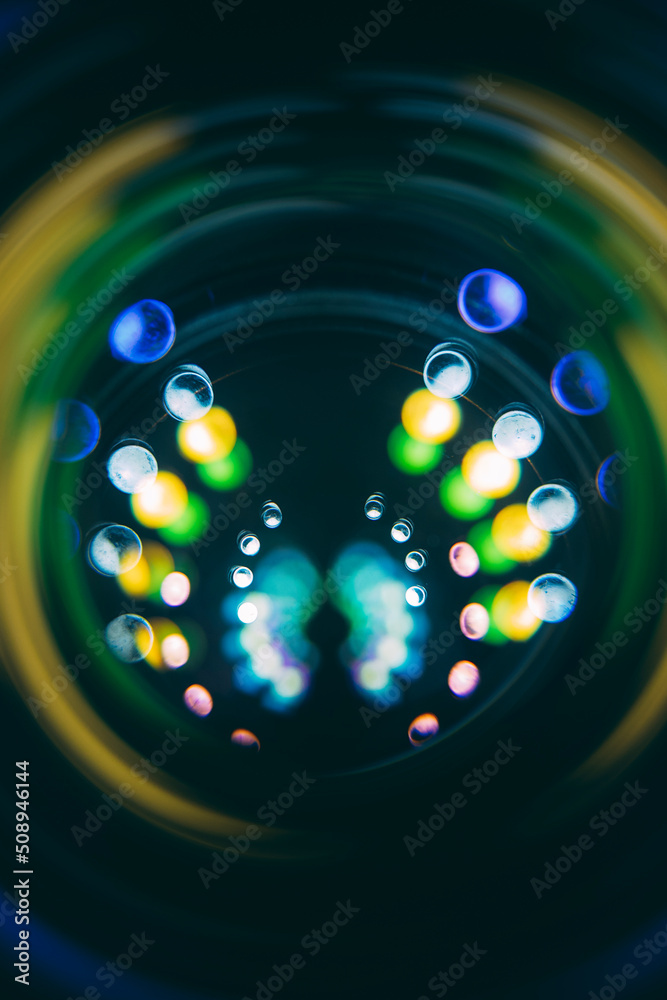 A ball of color spreads in the camera lens A ball of color spreads in the camera lens