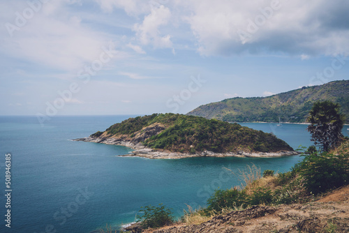 Beautiful mountains with palms landscape in the ocean