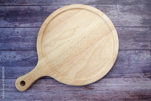 wooden chopping board on table top down 