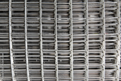 New splicing bars reinforcement metal welding mesh net close up. Building materials for concrete manufacturing.