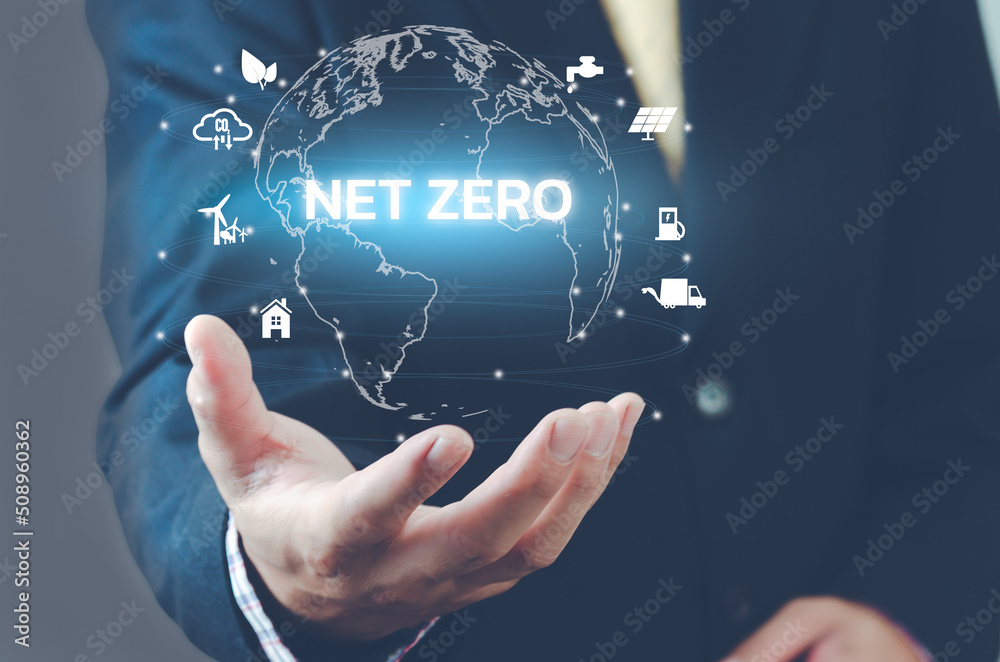 Man hand virtual world icon. NET ZERO icons and symbols save the eco world and reduce pollution virtual screen. Business eco concept. Man hand virtual world icon. NET ZERO icons and symbols save the eco world and reduce pollution virtual screen. Business eco concept.