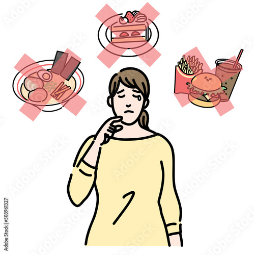 食事制限で辛そうにしている太った若い女性