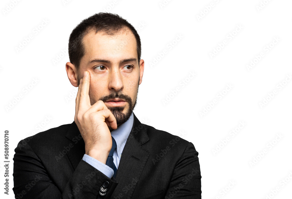 Young businessman in a thoughtful expression Young businessman in a thoughtful expression