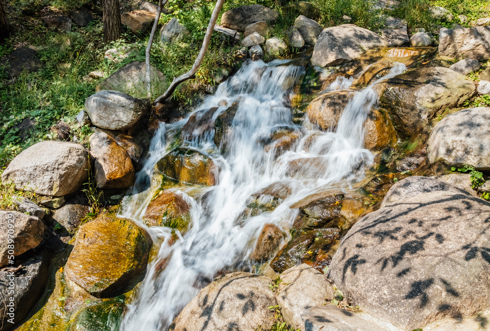 Fototapeta premium Mountain stream waterfall water scenery shooting