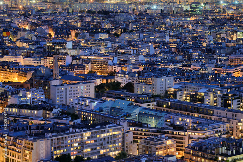Aerial high-angle view of urban area in Paris at evening time