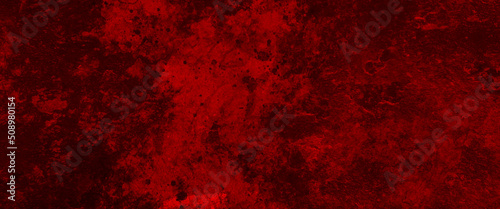 Red background with vintage texture. old color background in distressed marbled style design, Scary red wall for background. red wall scratches, Cracked shabby old cement.