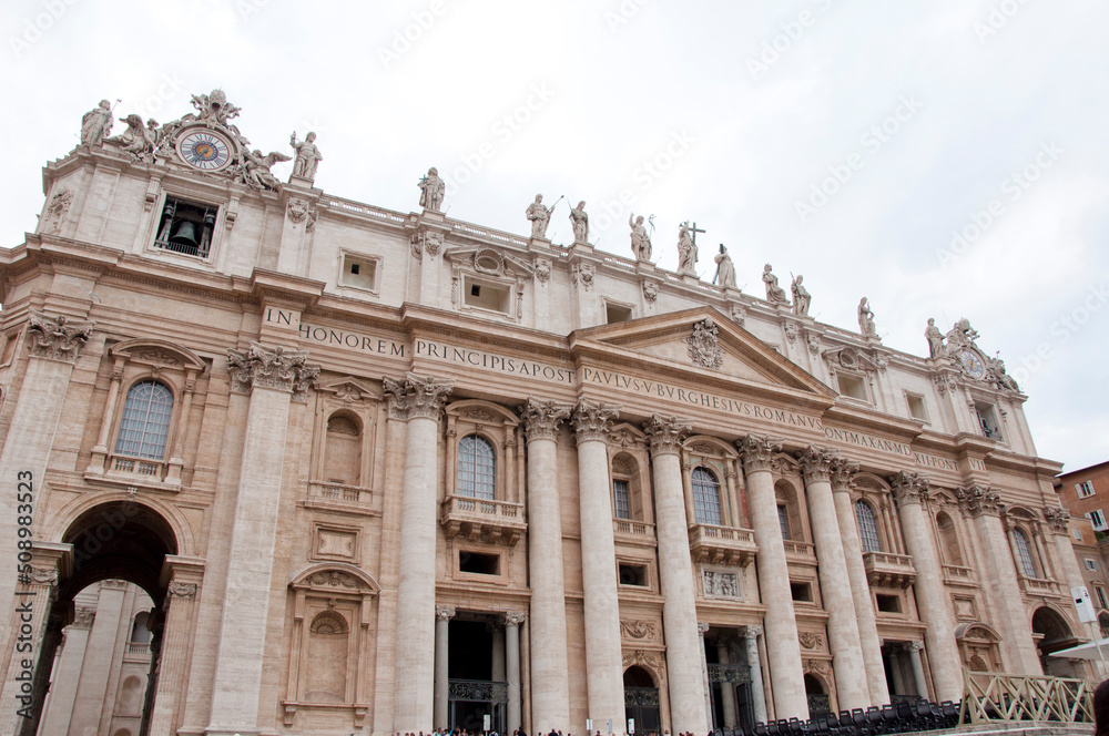 Saint Peters Basilica facade exterior with colums and pediment in Vatican