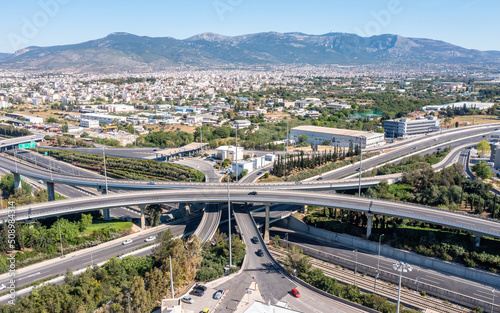 Fototapeta Naklejka Na Ścianę i Meble -  Attiki Odos toll road interchange and National highway in Attica, Athens, Greece. Aerial drone view
