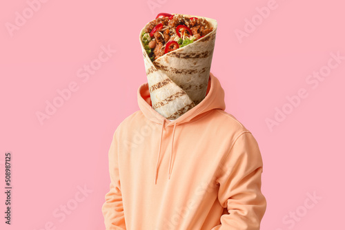 Man with tasty burrito instead of his head on pink background