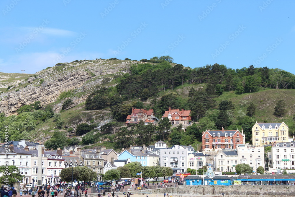 A landscape shot of the Great Orme as seen from the Promenade at Llandudno in North Wales. This photo was taken during the Bank Holiday weekend.