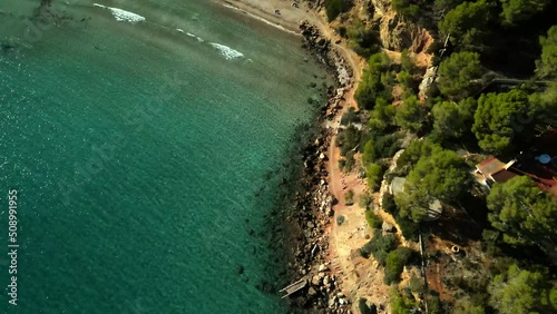 Cala Llenya beach in Ibzia, Spain photo