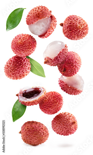 Set of flying lychee fruits isolated on white background. photo