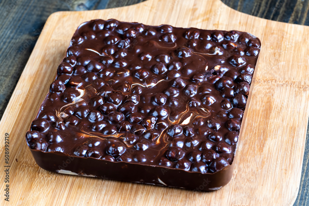 homemade chocolate with lots of hazelnuts homemade chocolate with lots of hazelnuts