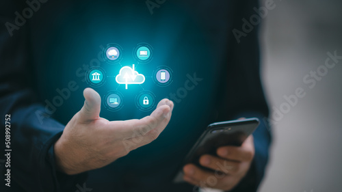 Man using smartphone showing cloud computing diagram in hand cloud technology data storage network and internet service concept