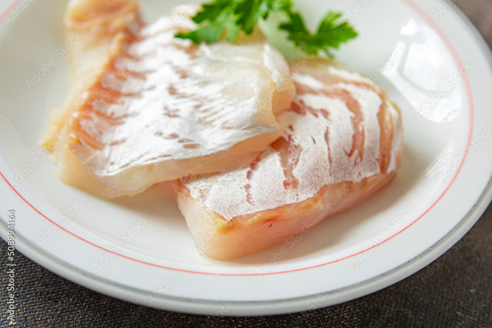 cod white fish fillet fresh healthy meal food snack diet on the table copy space food background rustic top view pescatarian diet cod white fish fillet fresh healthy meal food snack diet on the table copy space food background rustic top view pescatarian diet